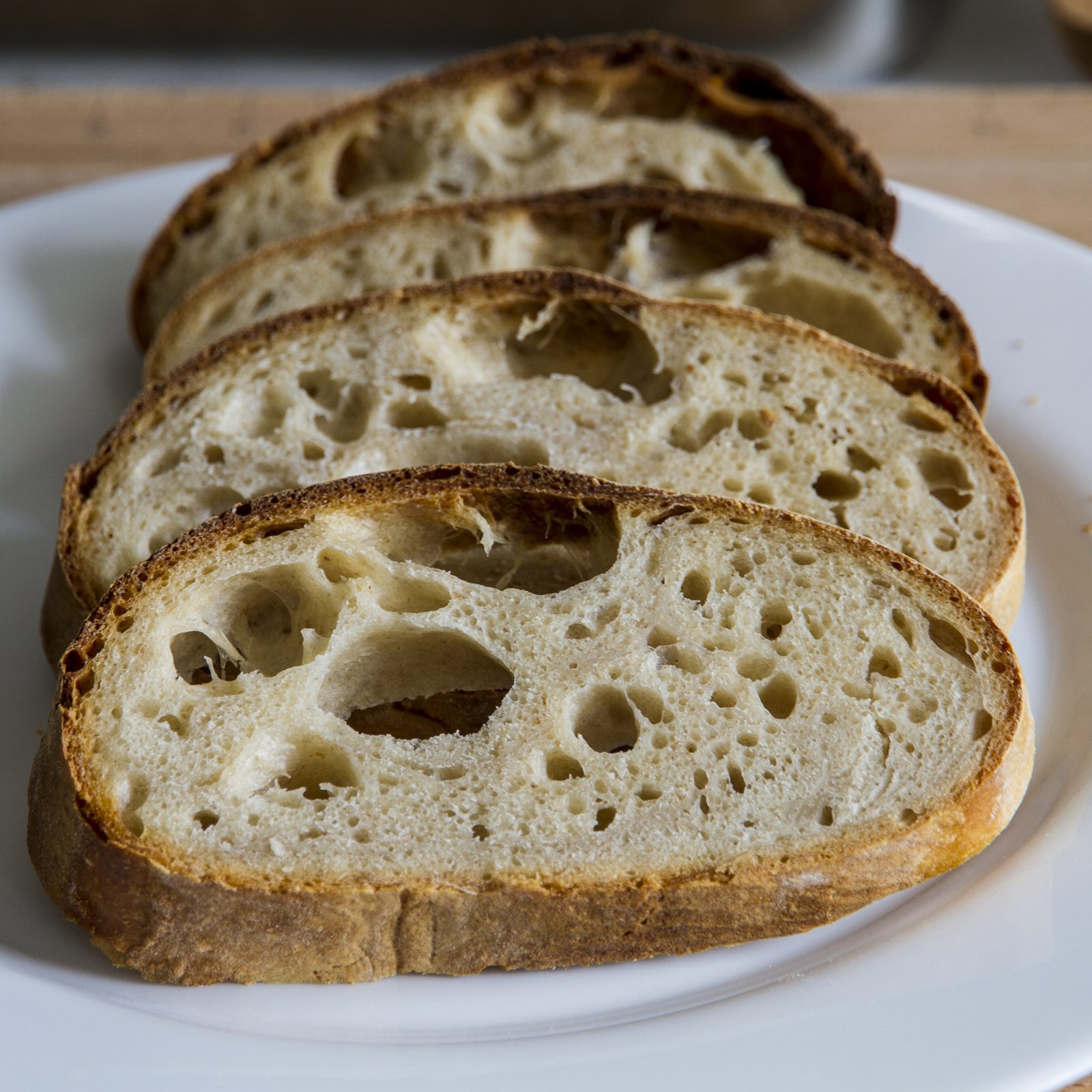 Slices of sourdough showing open crumb